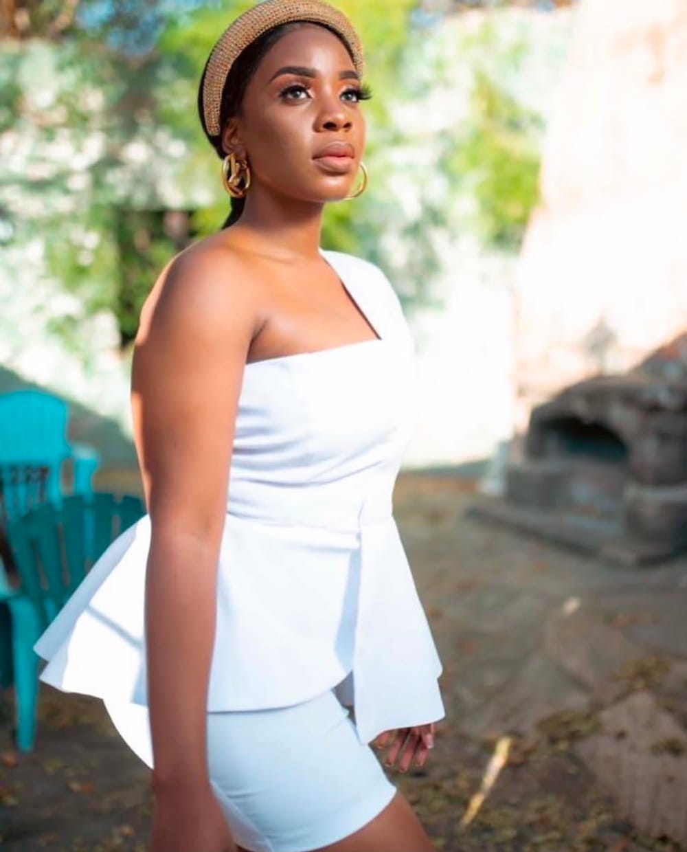 Outdoor portrait shoot in a white peplum outfit